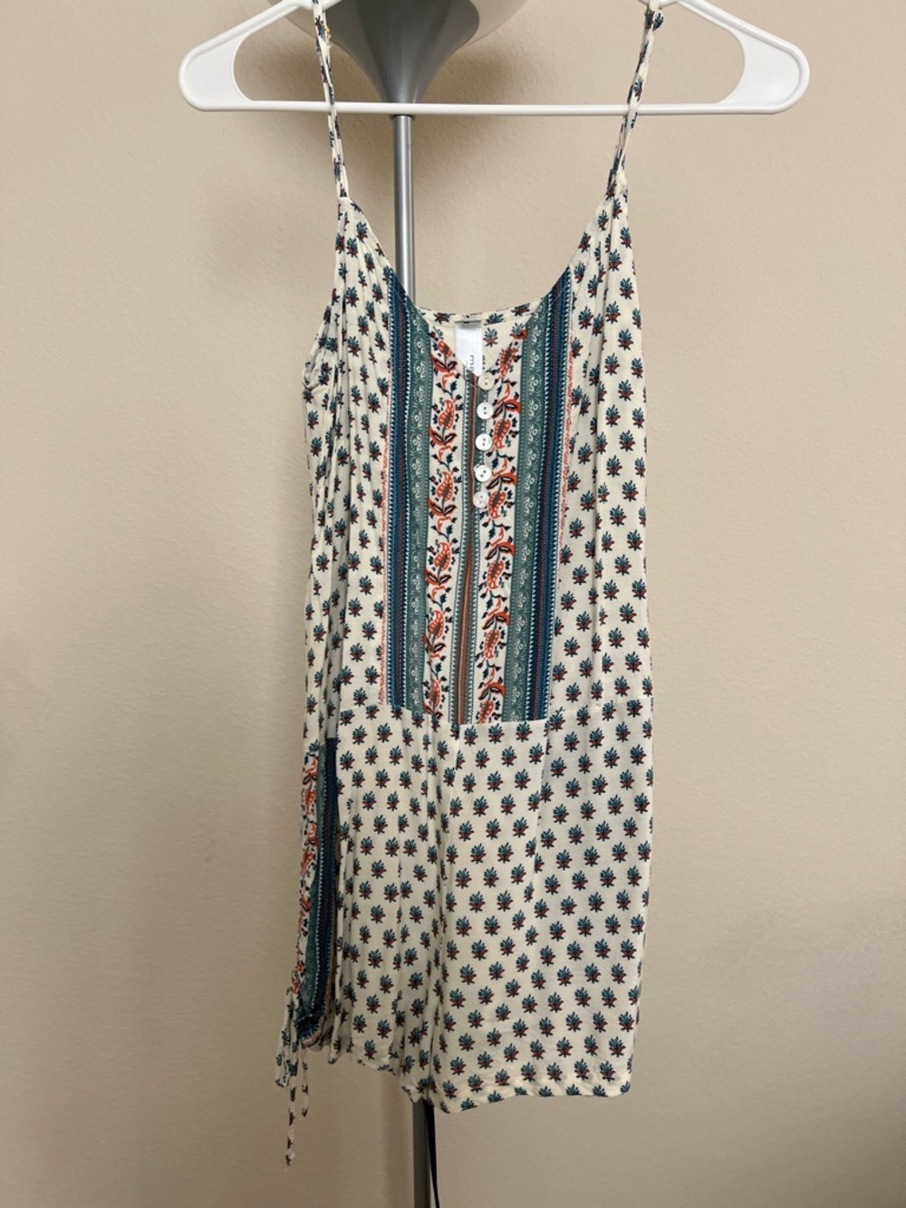 Never worn - mahina Cream Romper with Blue and Rust Floral Stripes